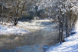 Small river as an enchanted winter landscape