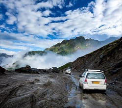 Vehicles on bad road in Himalayas. Near Rohtang La pass