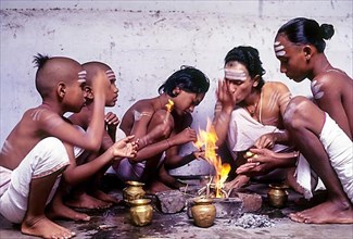 Brahmin youths of Vedic School at their morning rituals in Kumbakonam