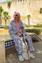 Old woman in traditional djellaba or kauezen coat