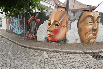 Graffiti by Jonas Fehlinger 2018 with Fasnet Fasnacht masks in the Goldgrubengasse in Villingen