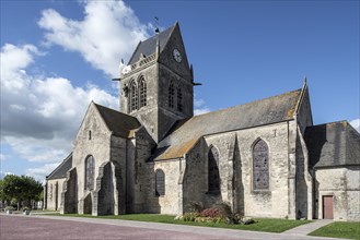 Church of Sainte-Mere-Eglise with parachute memorial in honour of paratrooper John Steele
