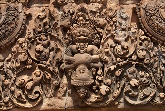 Bas-relief in Khmer Hindu temple depicting Vishnu ripping the breast of King Hiranyakasipu