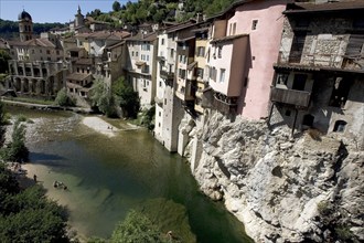 Houses suspended over river