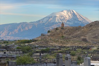 Cemetery of the village Khor Virap with the monastery and Mount Ararat behind