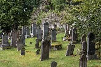 Weathered gravestones in Lochcarron Old Cemetery