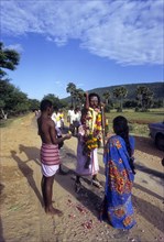 The Poojari or Pujari of Village guardian temple blessing the people during a village festival