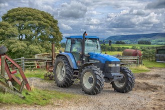 New Holland 8260 tractor in farmyard