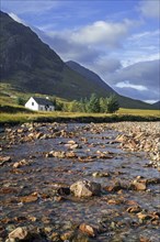 The remote Lagangarbh Hut along River Coupall in front of Buachaille Etive Mor in Glen Coe