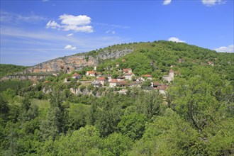 View of village on slope of limestone gorge