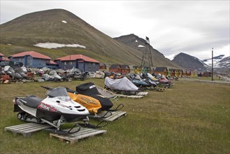 (Skidoos) in town during summer, world's most northerly town, Longyearbyen, Spitzbergen, Svalbard