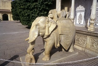 Marble elephant with lotus flower guarding Rajendra Pol