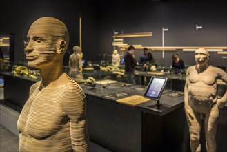 Life-size 3D reconstructions of hominid species depicting human evolution in the Gallery of Humanity at the Royal Belgian Institute of Natural Sciences