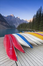Colourful canoes at Moraine Lake in the Valley of the Ten Peaks