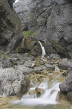 Water flowing through a limestone gorge