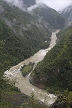 View of river and forested valley slopes