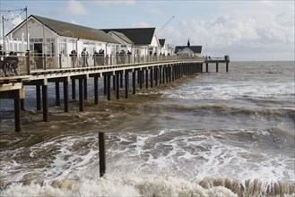 View of restored pier with rough sea