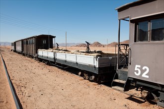 Railway wagon with stand for machine gun