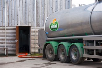Arla milk tanker loading milk at dairy farm