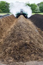 Komptech self-propelled compost turner turning rotting bedding manure