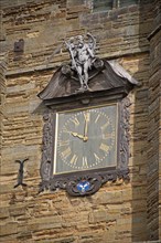 Decorative clock with 'Old Father Time' on church tower
