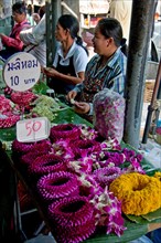 Flower vendors at Bangkok's Pak Khlong Talat market