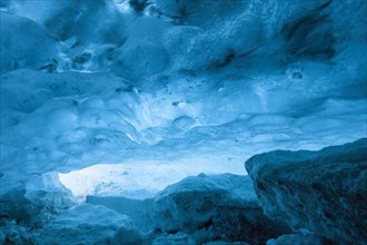 Blue ice mixed with volcanic ash in ice cave inside Breidamerkurjokull