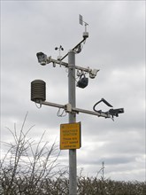 Weather station with sign These are not speed cameras