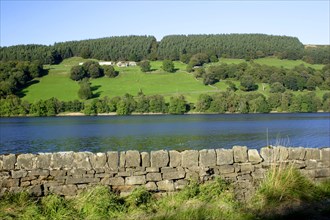 View of dry stone wall and reservoir