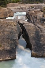 Natural Bridge spans the course of the Kicking Horse River in Yoho National Park