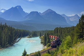 Canadian Pacific Railway goods train along the Bow River at Morant's Curve