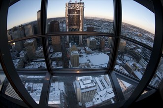 View of the snow-covered city from the observation tower