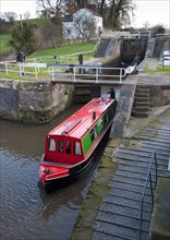 Narrowboat passing through the canal lock