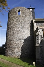 View of church with Norman round-tower