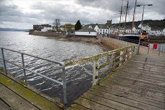 Jetty and town on the shore of the loch