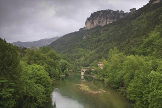 View of Gorges du Tarn with River Tarn and ruined bridge of la Muse