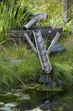 Bamboo water feature and garden pond
