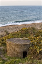 FW3 Type 25 Second World War pillbox overlooking the beach
