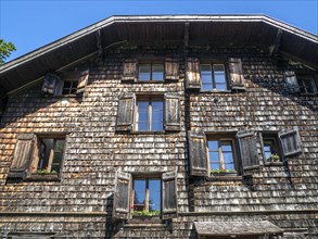 House with wooden shingles at the Wolfgangsee in the Salzkammergut