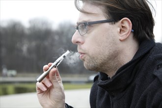 Man with e-cigarette