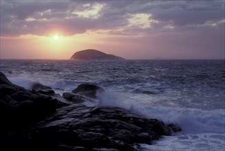 View of the coastline at sunset