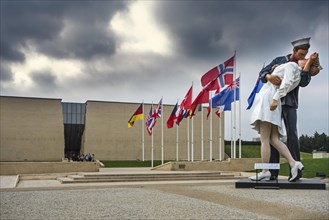 Sculpture Unconditional Surrender showing a World War II sailor and nurse kissing at the Memorial de Caen
