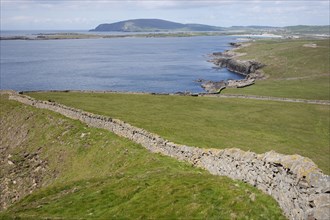 View of dry stone walls and coastline