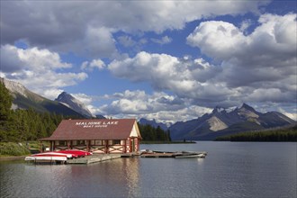 Boathouse with canoes at Maligne Lake