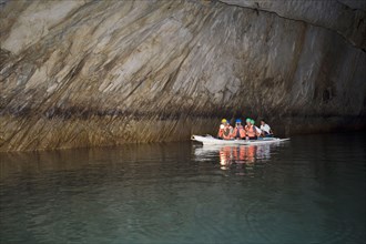 Tourist boat in cave on underground river