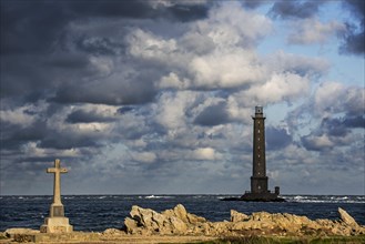Lighthouse at Cap de La Hague and monument in honour of the French submarine crew Vendemiaire