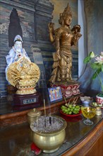 Buddha statue on an altar in a prayer room of the Buddhist monastery Brahma Vihara