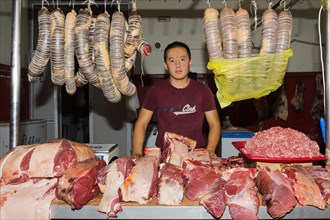 Kazakh man selling meat