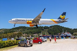 An Airbus A321 aircraft of Thomas Cook Airlines with registration G-TCDL lands at Skiathos airport
