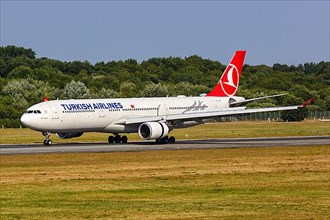 A Turkish Airlines Airbus A330-300 with registration TC-JNS at Hamburg Airport